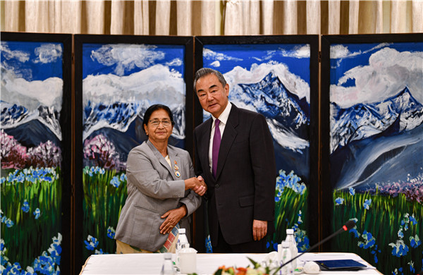 Wang Yi (R), a member of the Political Bureau of the Communist Party of China Central Committee and director of the Office of the Central Commission for Foreign Affairs, meets with Urmila Aryal, vice chairperson of the National Assembly of Nepal, in Nyingchi, southwest China's Xizang Autonomous Region, October 5, 2023. /Chinese Foreign Ministry
