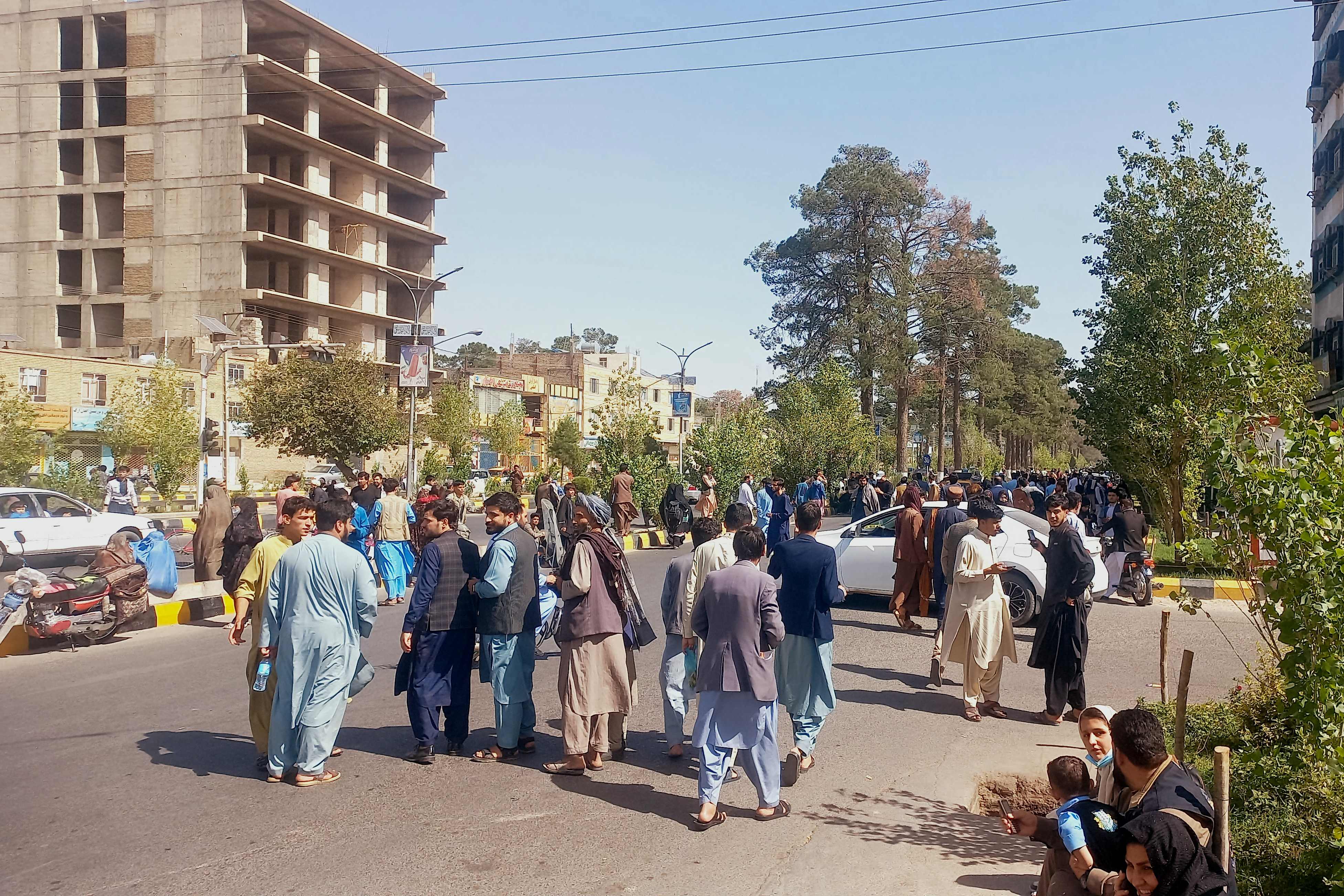 People gather on the streets in Herat in west Afghanistan after a magnitude-6.3 earthquake hit the country, October 7, 2023. 