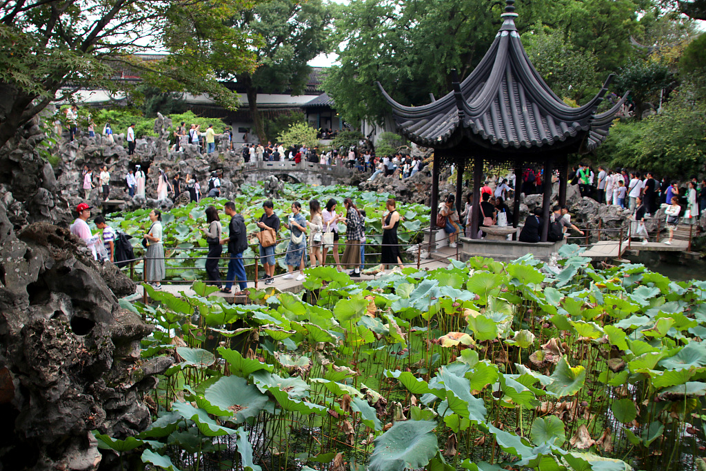 A photo taken on October 3, 2023 shows tourists at Lion Grove Garden in Suzhou, Jiangsu. /CFP