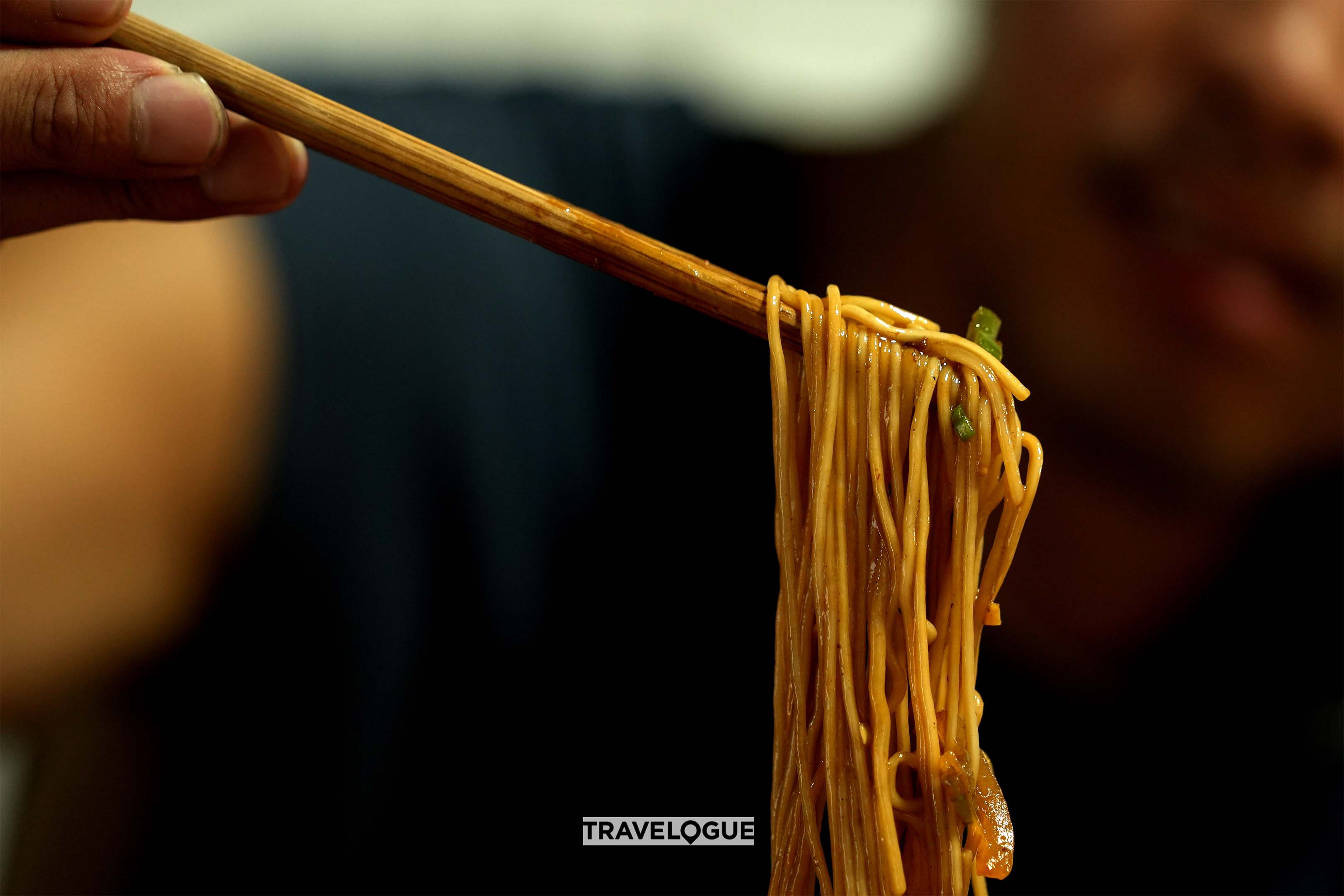 A customer eats noodles at a restaurant in Nanxun ancient town in Huzhou, Zhejiang Province. /CGTN 