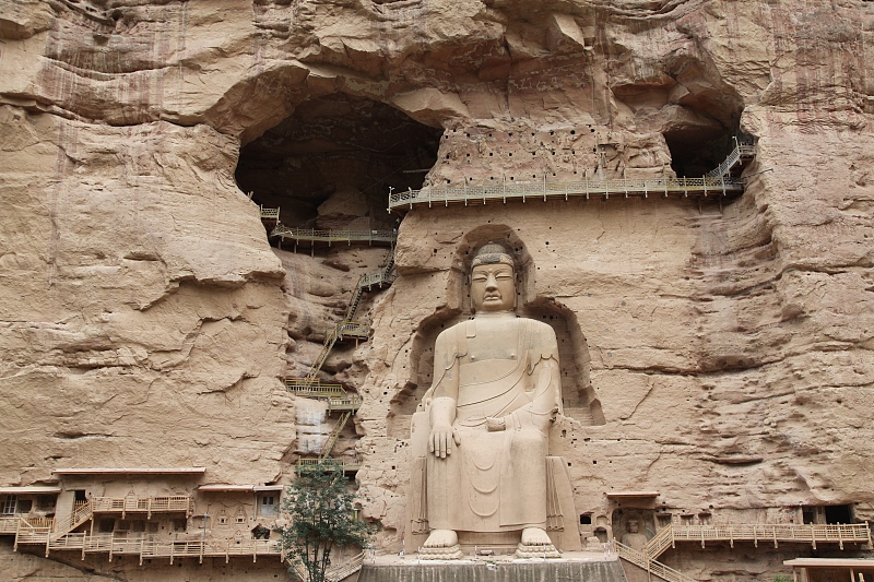 A giant Buddhist sculpture is carved into a grotto in Gansu Province. /CFP