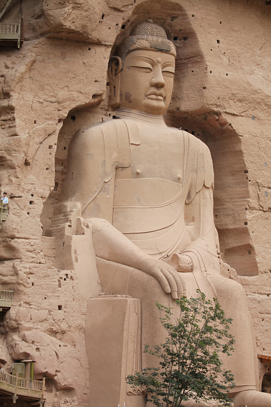 A giant Buddhist sculpture is carved into a grotto in Gansu Province. /CFP