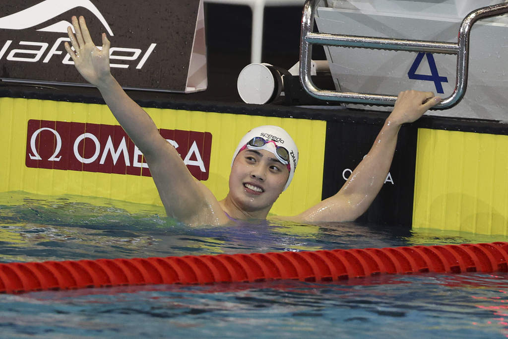 China's Zhang Yufei reacts after winning the women's 100m butterfly event at the World Aquatics Swimming World Cup in Berlin, Germany, October 8, 2023. /CFP