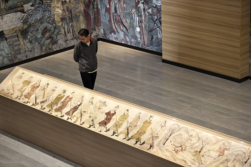 A visitor appreciates artworks at the Jinzhiyuan Mural Museum in Jinzhong City, Shanxi Province, October 8, 2023. /CFP