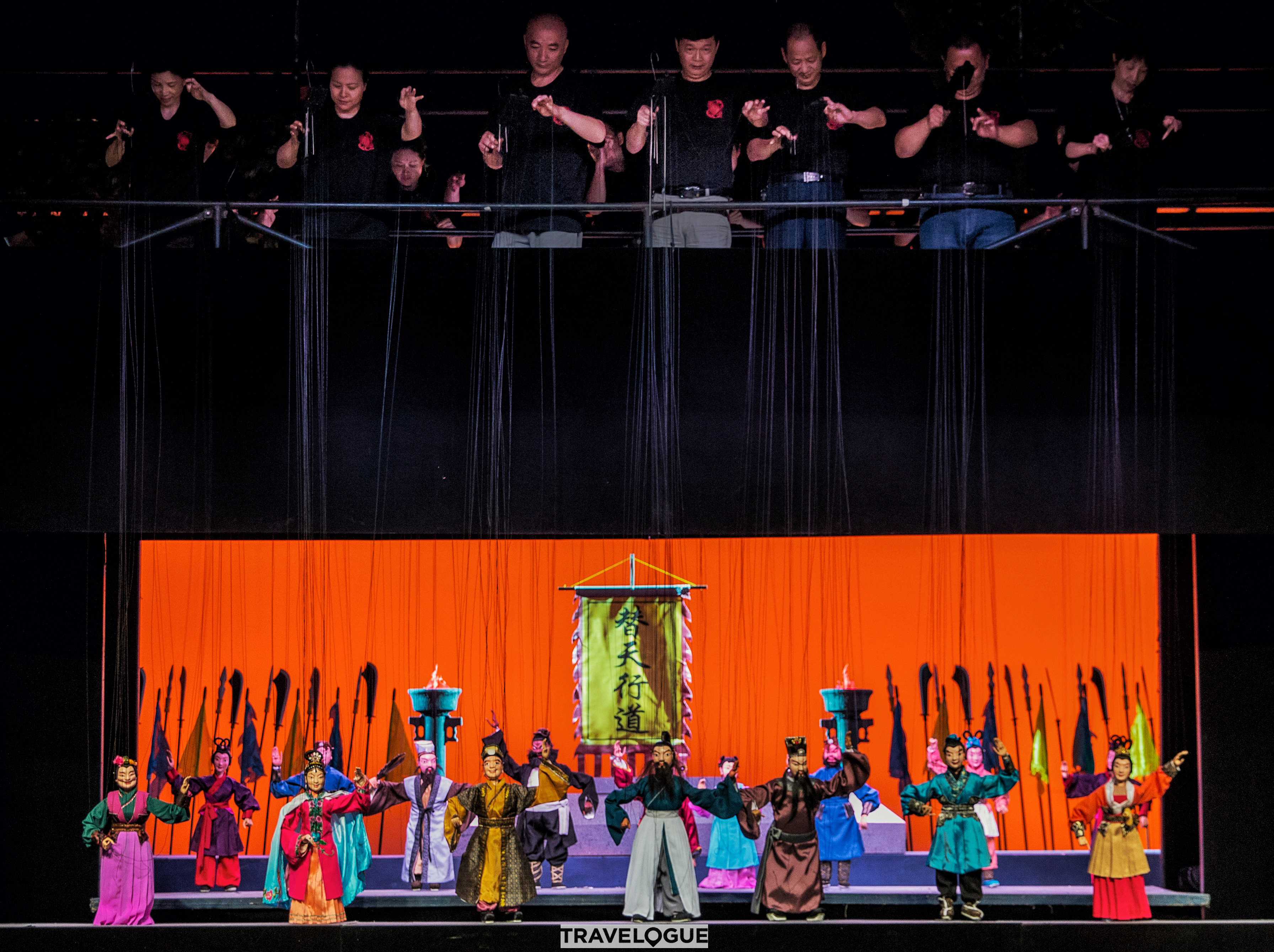 Puppeteers control the marionettes during a show in Quanzhou, Fujian Province. /CGTN