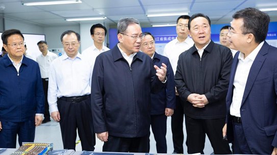 Chinese Premier Li Qiang, also a member of the Standing Committee of the Political Bureau of the Communist Party of China Central Committee, visits Semitronix Corporation, a semiconductor equipment supplier, in east China's Zhejiang Province, October 7, 2023. /Xinhua