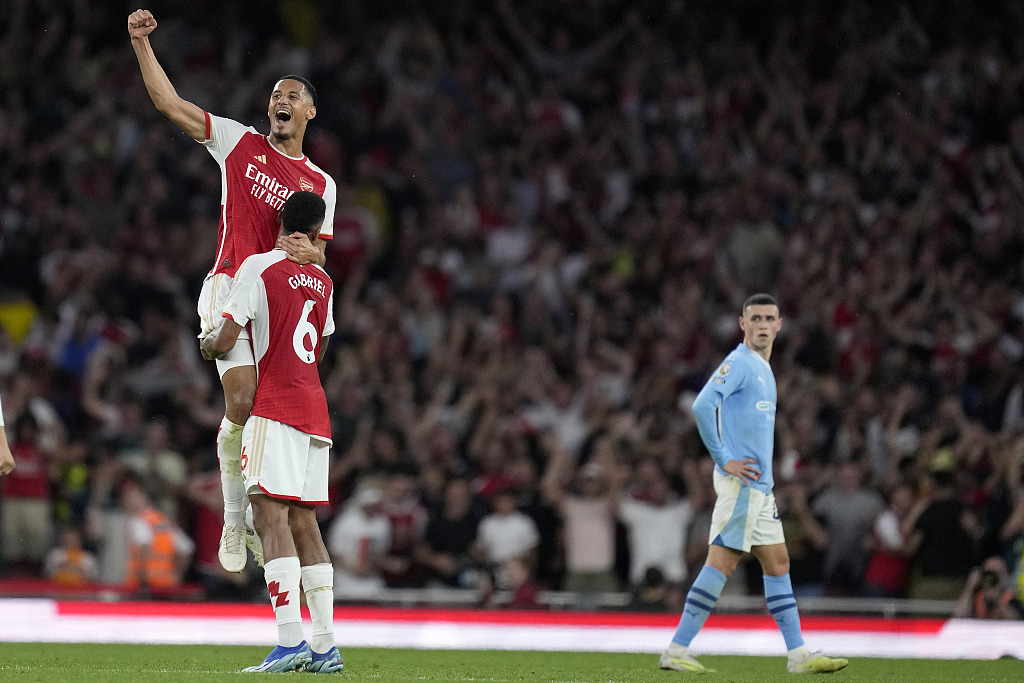Players of Arsenal (L) celebrate after scoring a goal in the Premier League game against Manchester City at the Emirates Stadium in London, England, October 8, 2023. /CFP