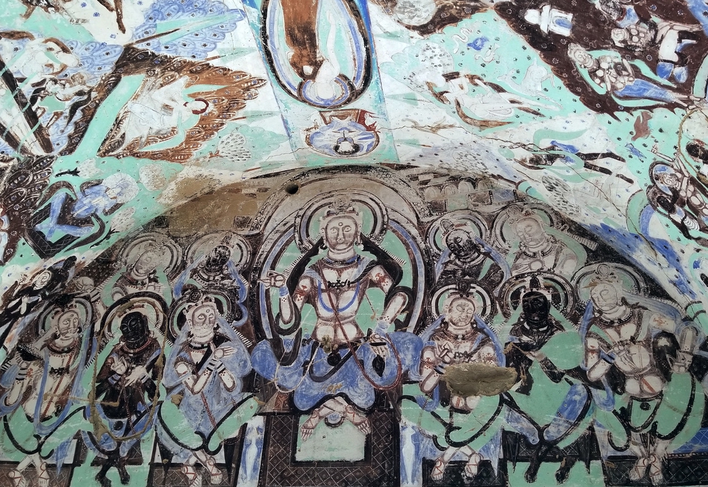 Some colorful Buddhist murals at the Kizil Grottoes in Xinjiang. /IC
