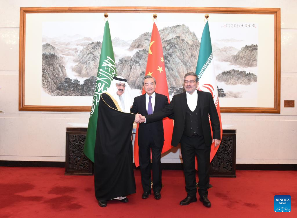 Wang Yi (C), a member of the Political Bureau of the Communist Party of China Central Committee, attends a closing meeting of the talks between the Saudi delegation led by Saudi Arabia's Minister of State Musaad bin Mohammed Al-Aiban (L) and the Iranian delegation led by Secretary of the Supreme National Security Council of Iran Admiral Ali Shamkhani in Beijing, capital of China, March 10, 2023. /Xinhua