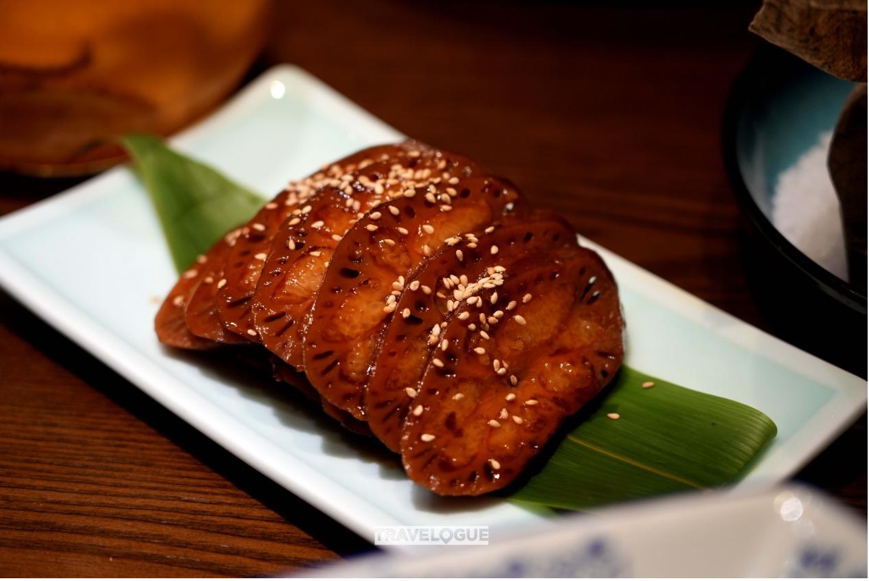 Sweet lotus roots with osmanthus jam are served at a restaurant in Nanjing, China. /CGTN