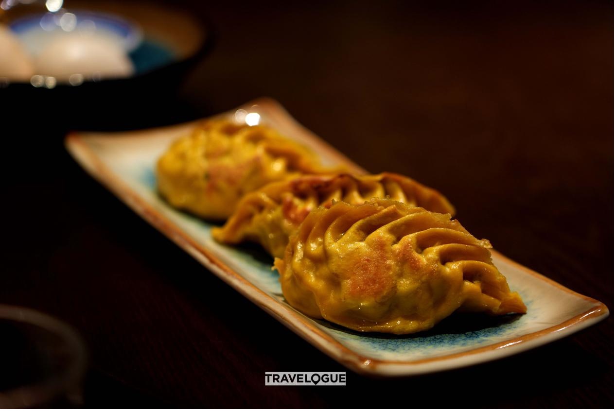 Fried dumplings are served at a restaurant in Nanjing, China. /CGTN