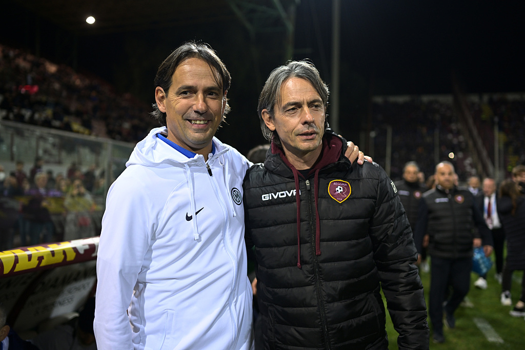 Simone Inzaghi (L), manager of Inter Milan, and Filippo Inzaghi, manager of Reggina, pose for a portrait together before the friendly at Stadio Oreste Granillo in Reggio Calabria, Italy, December 22, 2022. /CFP