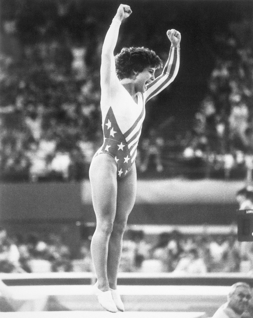Mary Lou Retton of the U.S. leaps off her feet after her performance on the vault in the women's gymnastics at the 1984 Los Angeles Olympic Games. /CFP 