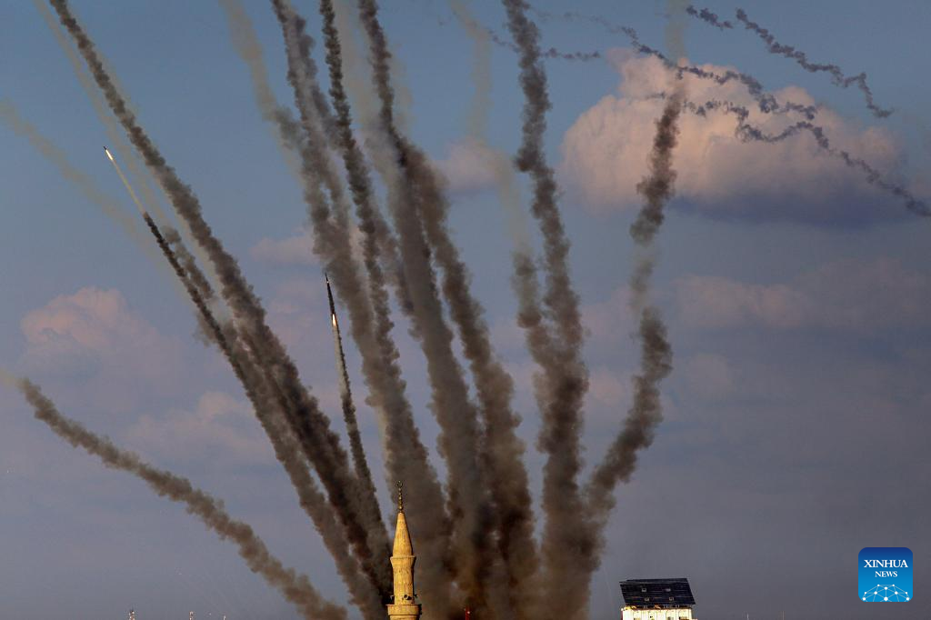 A barrage of rockets are fired from Gaza toward Israel over Gaza City, October 10, 2023. /Xinhua