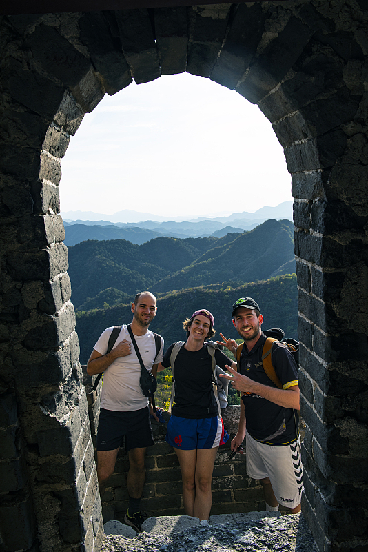 Visitors take photos at the Jinshanling section of the Great Wall in Luanping County, Hebei Province, October 10, 2023. /CFP