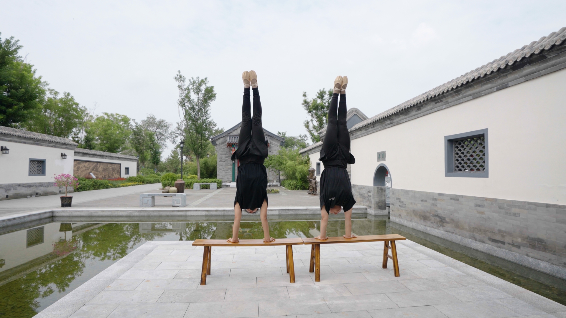 Young acrobats are practicing stunts in Wuqiao, Cangzhou. /CGTN