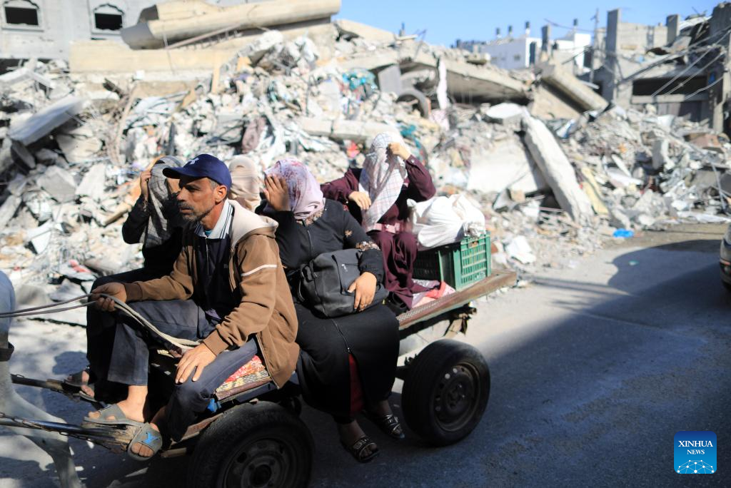 Palestinians flee their homes in the southern Gaza Strip after the Israeli Defense Forces ordered residents of Gaza City to evacuate to the southern area of the coastal enclave ahead of a possible Israeli ground offensive, October 13, 2023. /Xinhua