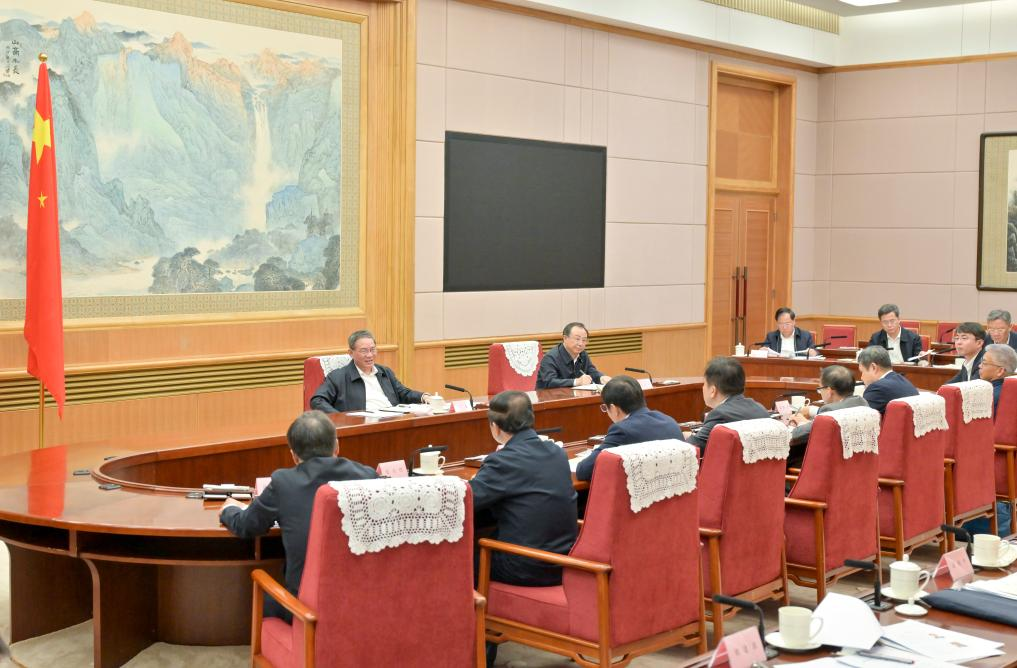 Chinese Premier Li Qiang, also a member of the Standing Committee of the Political Bureau of the Communist Party of China Central Committee, presides over a symposium on the economic situation attended by economists and entrepreneurs in Beijing, China, October 13, 2023. /Xinhua