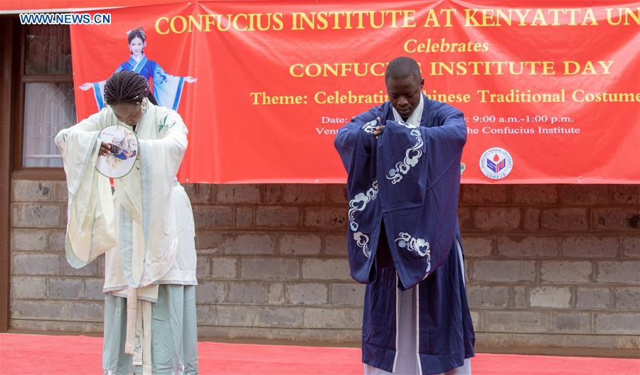 Students present Chinese traditional costume at the Confucius Institute of Kenyatta University in Nairobi, Kenya, September 28, 2018. /Xinhua