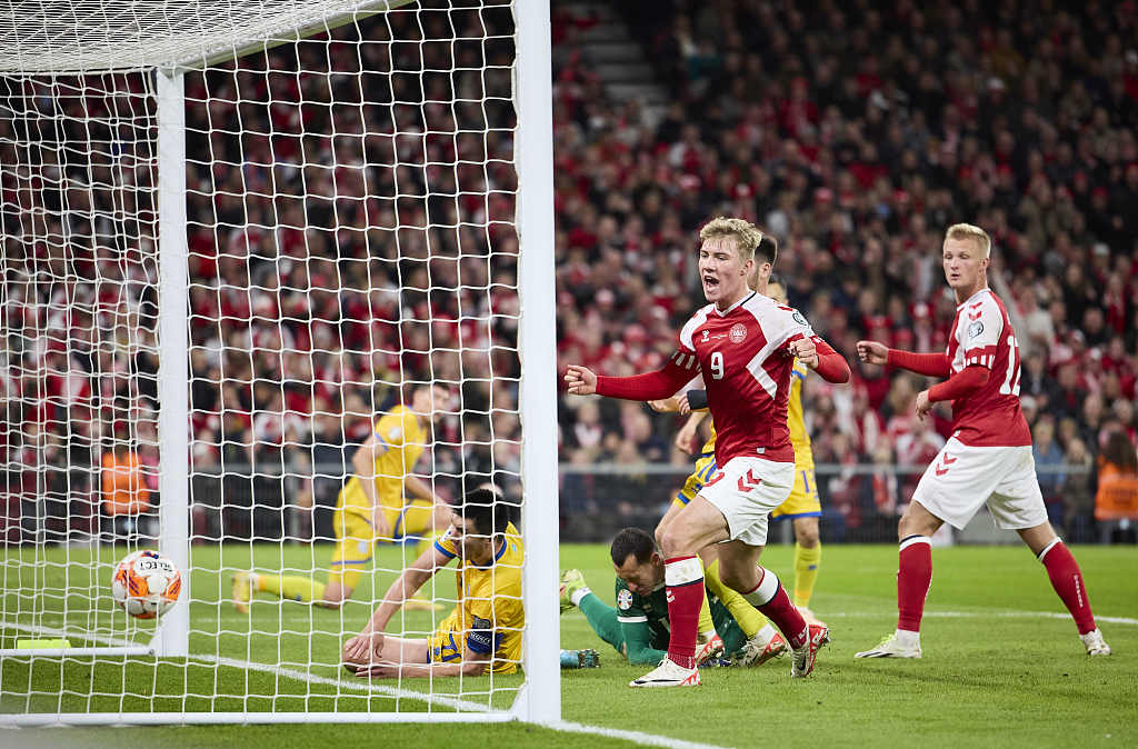 Rasmus Hojlund (#9) celebrates after scoring Denmark's first goal against Kazakhstan during their Euro 2024 qualifier at Parken in Copenhagen, Denmark, October 14, 2023. /CFP