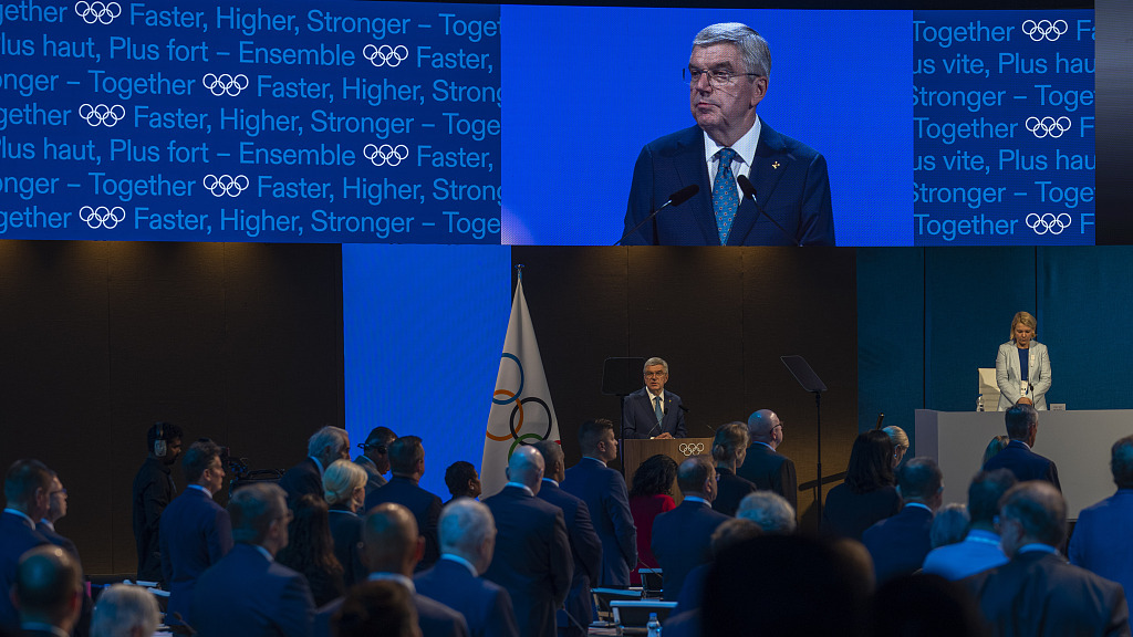 IOC President Thomas Bach addresses the first day of the 141st IOC session in Mumbai, India, October 15, 2023. /CFP