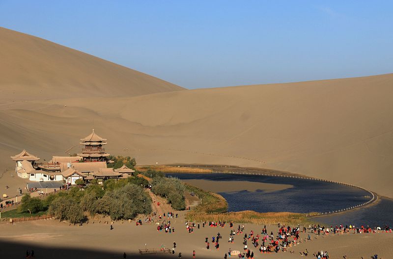 As one of Gansu Province's most famous tourist spots, the Mingsha Mountain Crescent Spring Scenic Area attracts tens of thousands of visitors a year. /CFP