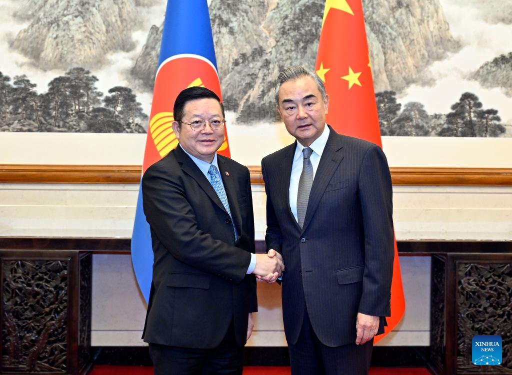 Chinese Foreign Minister Wang Yi, who is also a member of the Political Bureau of the Communist Party of China Central Committee, meets with Secretary-General of the ASEAN Kao Kim Hourn in Beijing, capital of China, October 16, 2023. /Xinhua