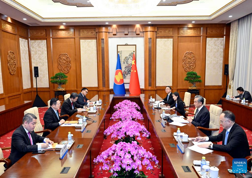 Chinese Foreign Minister Wang Yi, who is also a member of the Political Bureau of the Communist Party of China Central Committee, meets with Secretary-General of the ASEAN Kao Kim Hourn in Beijing, capital of China, October 16, 2023. /Xinhua