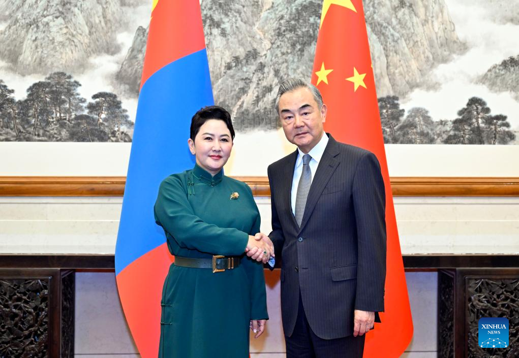 Chinese Foreign Minister Wang Yi, who is also a member of the Political Bureau of the Communist Party of China Central Committee, meets with Mongolian Foreign Minister Batmunkh Battsetseg in Beijing, capital of China, October 16, 2023. /Xinhua