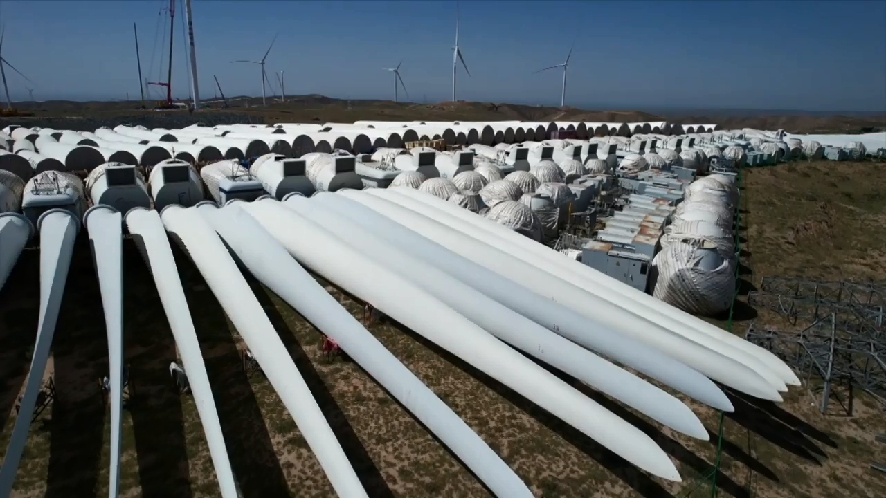 The decommissioned blades, generators, towers and other parts of wind turbines are in storage area. /CMG