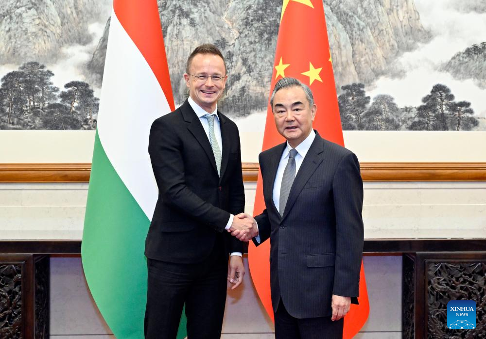 Chinese Foreign Minister Wang Yi, also a member of the Political Bureau of the Communist Party of China Central Committee, meets with Hungarian Minister of Foreign Affairs and Trade Peter Szijjarto in Beijing, China, October 16, 2023. /Xinhua