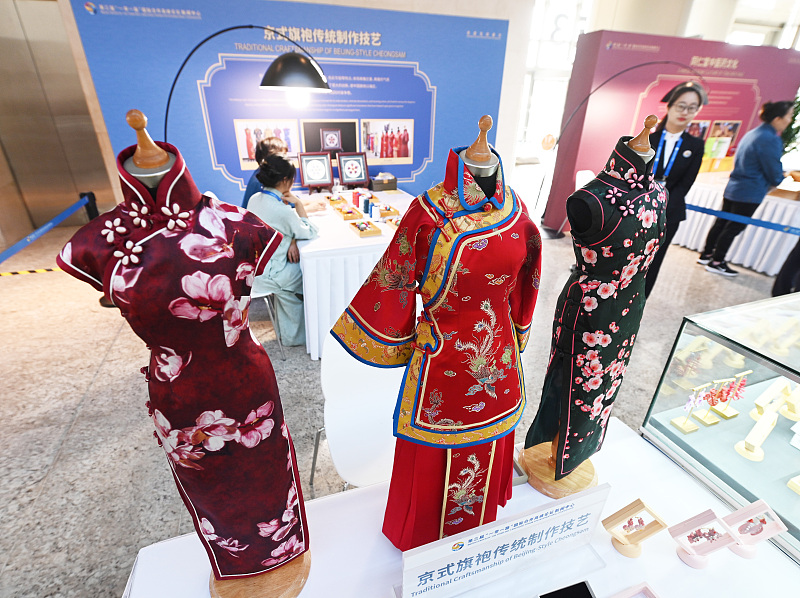 Traditional Chinese costumes are displayed at the media center for the third Belt and Road Forum for International Cooperation in Beijing, October 17, 2023. /CFP