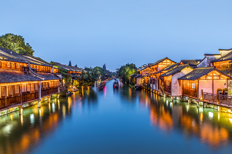 The ancient town of Wuzhen is seen bathed in evening light in Zhejiang Province. /CFP