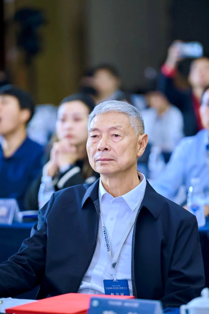 Zhang Dongshan, Director of the Sichuan Provincial Institute of Ancient Architecture Design and Research, takes part in the 1st International Conference on Ancient Wooden Architecture in Chengdu, southwest China's Sichuan Province on Oct. 18, 2023. /CGTN