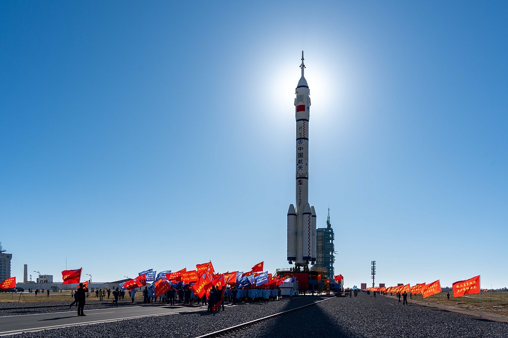 China's Shenzhou-17 spaceship and a Long March-2F carrier rocket transferred to the launch site, October 19, 2023. /CFP