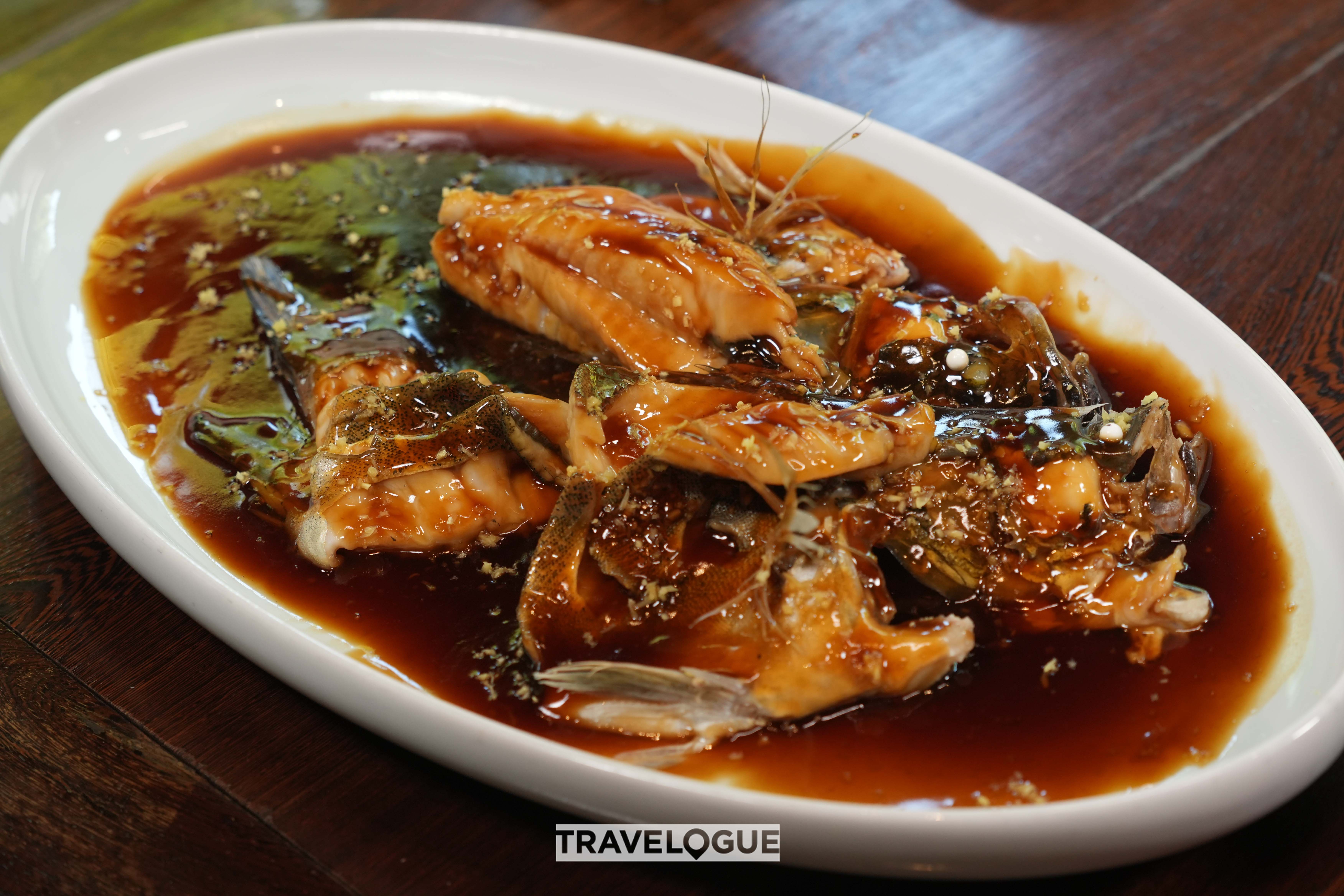 Seasonal river fish is served at Hangzhou's Michelin-starred Dragon Well Manor. /CGTN