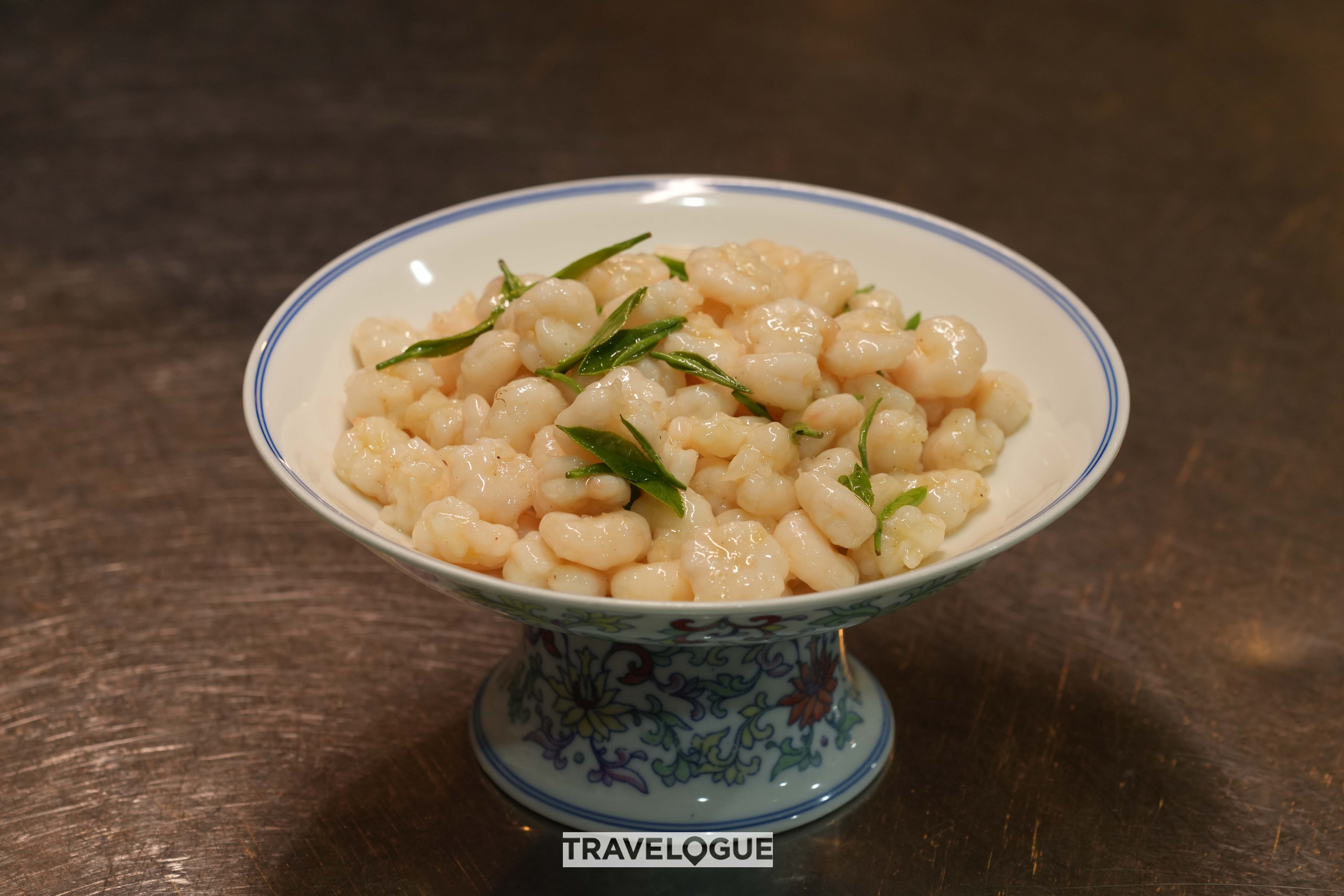 A dish of Longjing tea-infused shrimp is served at the Dragon Well Manor in east China's Hangzhou. /CGTN