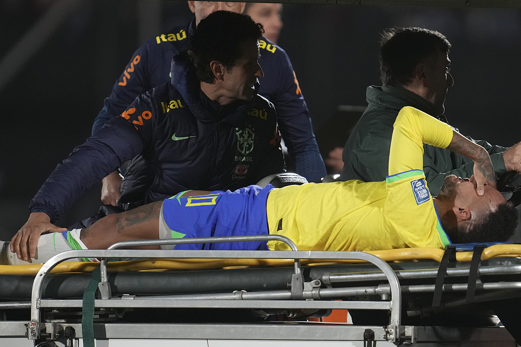 Brazil's Neymar is carried off the pitch on a stretcher after being injured during their clash with Uruguay at Centenario Stadium in Montevideo, Uruguay, October 17, 2023. /CFP