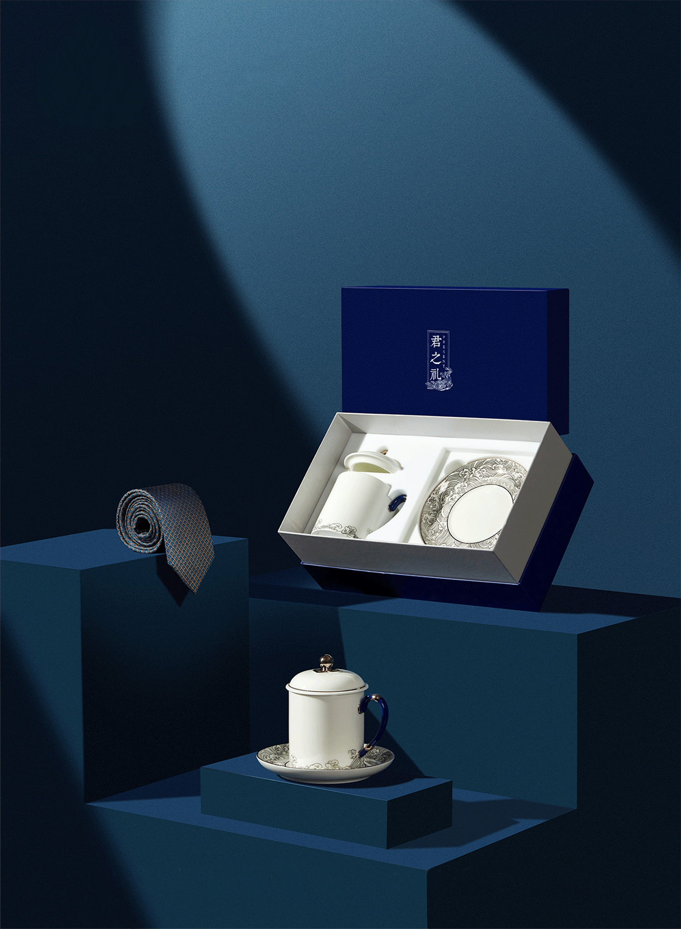 A porcelain cup and silk-tie gift set from Hangzhou, representing China's silk and porcelain culture. /Photo provided to CGTN