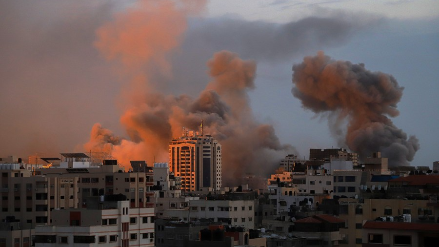 Smoke rises following an Israeli airstrike in Gaza City, October 9, 2023.