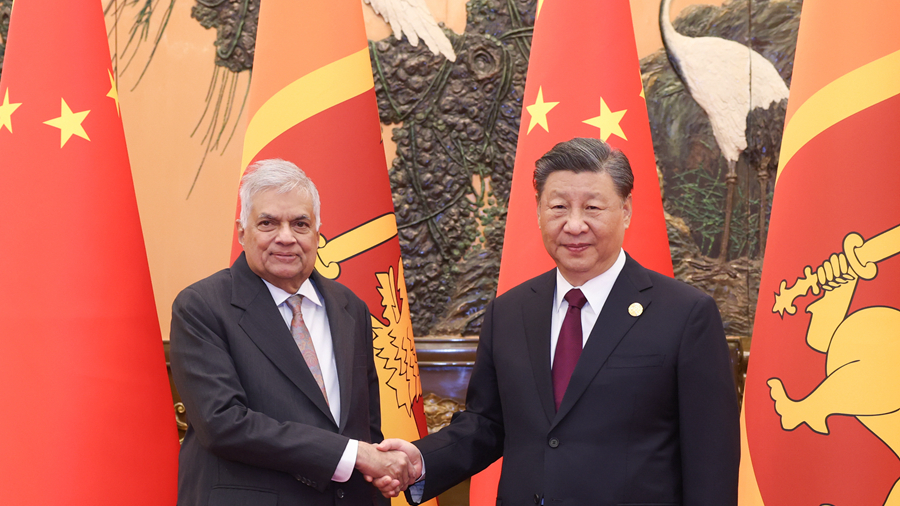 Chinese President Xi Jinping (R) shakes hands with Sri Lankan President Ranil Wickremesinghe in Beijing, China, October 20, 2023. /Xinhua