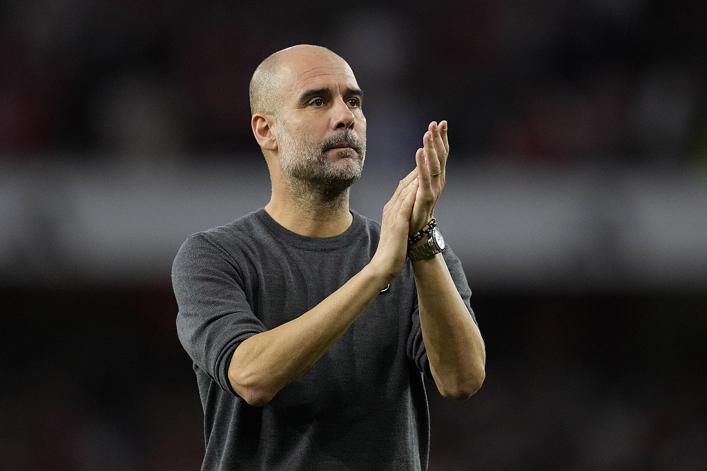 Pep Guardiola, manager of Manchester City, looks on after the 1-0 loss to Arsenal in the Premier League game at the Emirates Stadium in London, England, October 8, 2023. /CFP