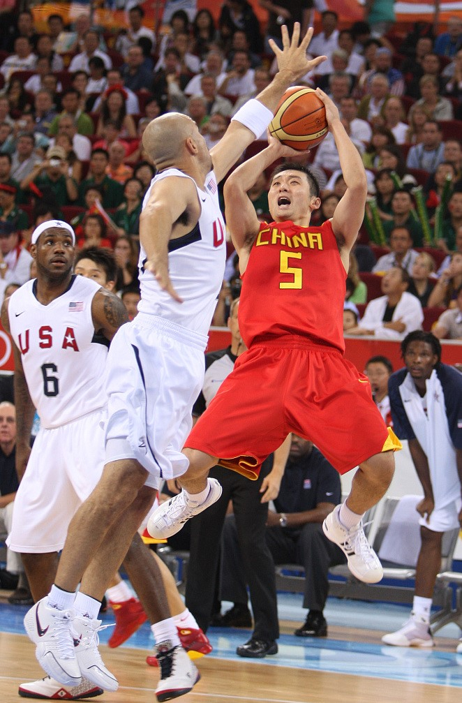 Liu Wei (#5) of China in basketball men's group game against USA at the Summer Olympic Games in Beijing, August 10, 2008. /CFP