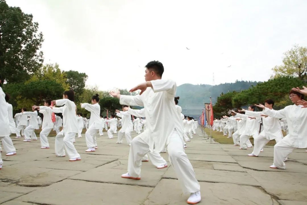 Participants perform Tai Chi during the 7th Wudang Tai Chi International Fellowship Competition in Shiyan, China's Hubei Province, on October 22, 2023. /CMG