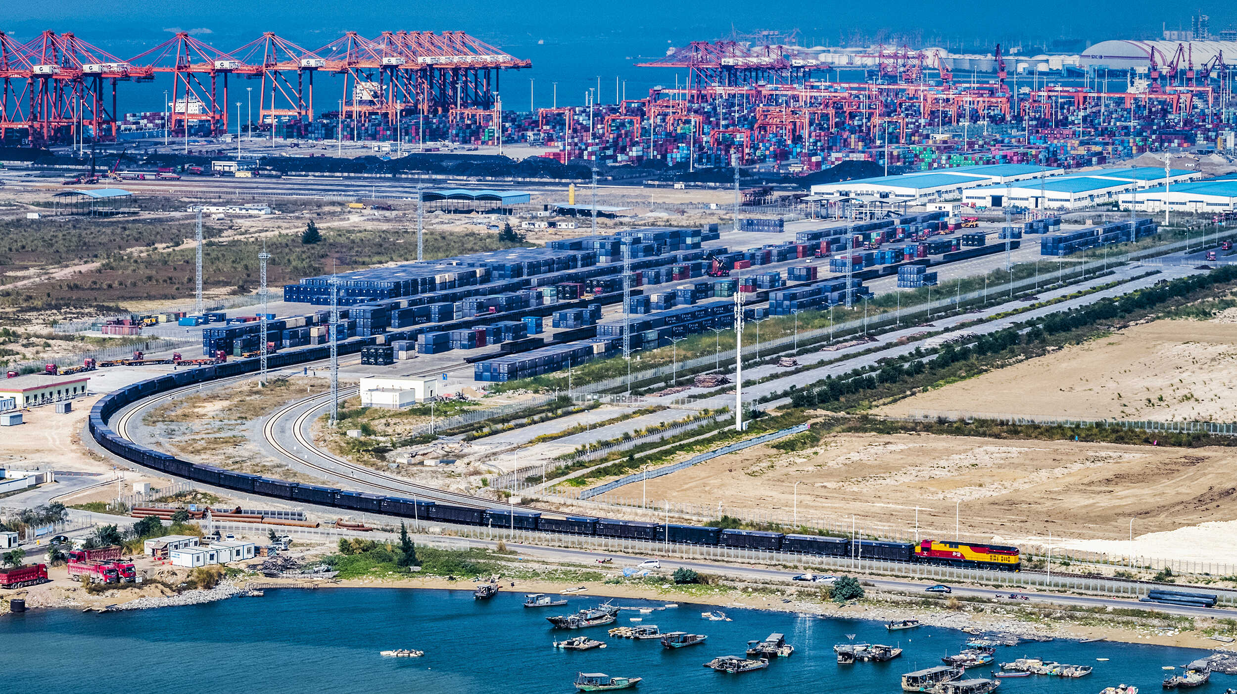The rail-sea routes of the New International Land-Sea Trade Corridor use ports in Guangxi's Beibu Gulf to offer a faster and cheaper freight transport option between western China and Southeast Asia. /CGTN