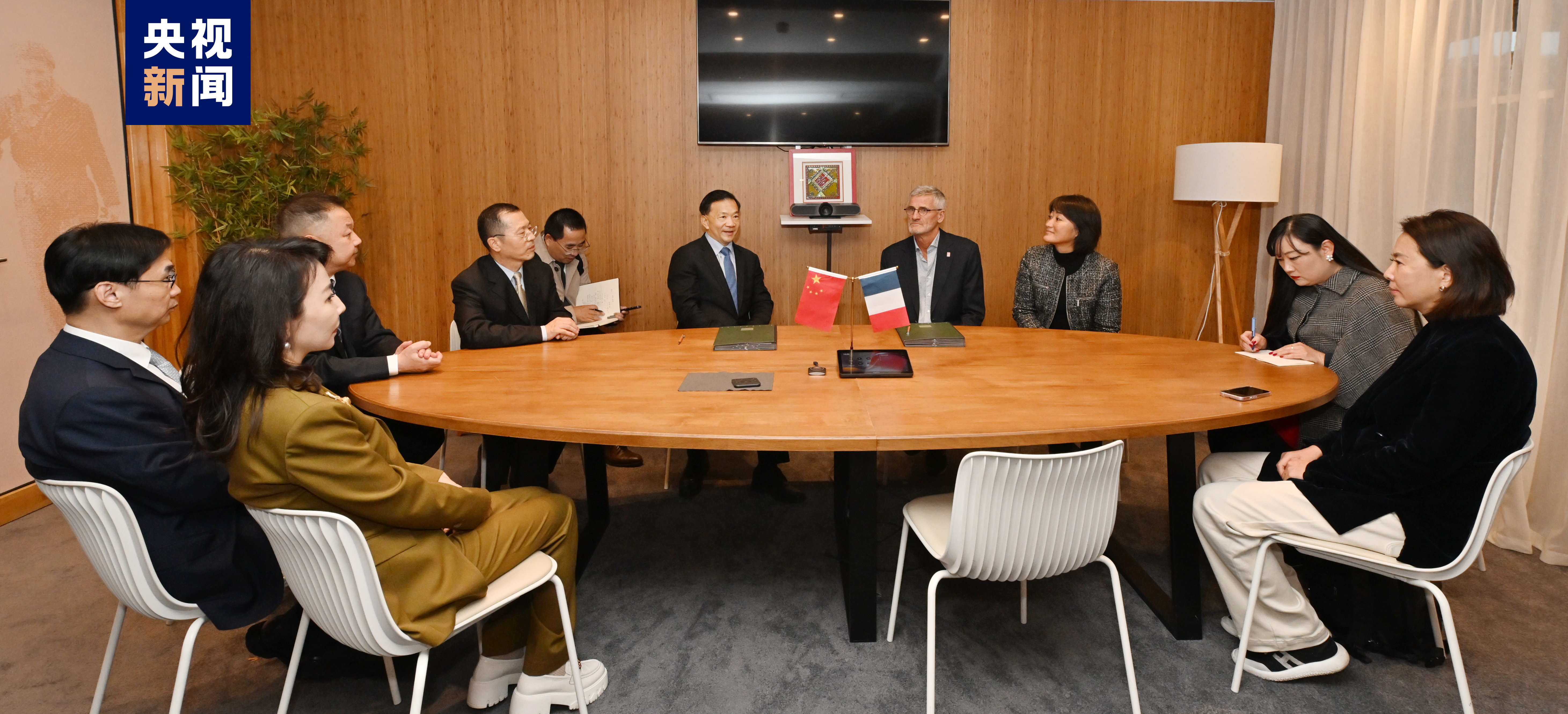 China Media Group and French Tennis Federation representatives sign a memorandum of cooperation, October 23, 2023. /CMG