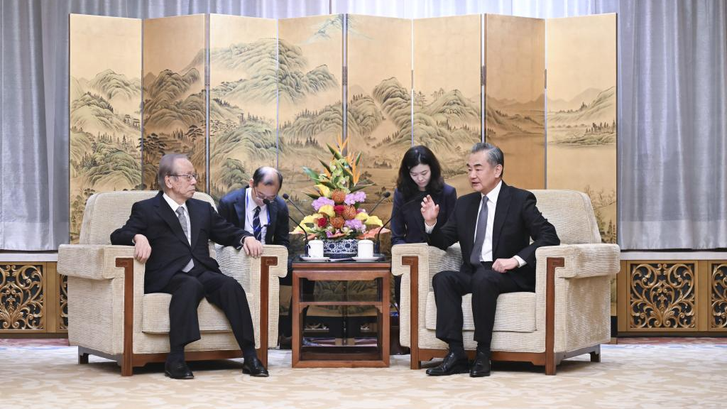 Wang Yi (R), director of the Office of the Central Commission for Foreign Affairs, also a member of the Political Bureau of the Communist Party of China Central Committee, meets with a Japanese friendship delegation led by former Japanese Prime Minister Yasuo Fukuda in Beijing, China, October 23, 2023. /Xinhua