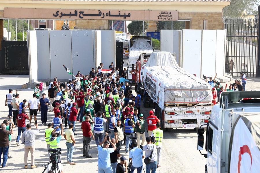 Trucks loaded with humanitarian aid enter Gaza at the Egyptian side of the Rafah border crossing with Gaza, October 21, 2023. /Xinhua