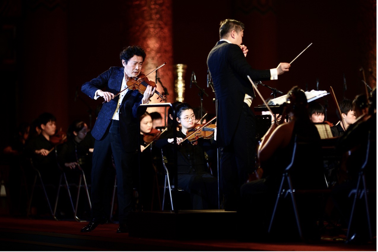 Young student performers join their tutors at a concert in Beijing to mark the end of a series of artistic exchange activities involving music enthusiasts from Beijing, Hong Kong and Macao on Oct. 15, 2023. /Photo provided to CGTN