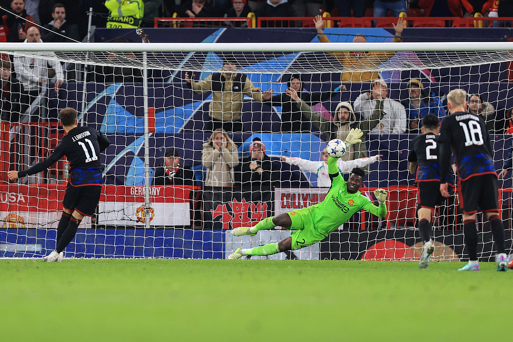 Goalkeeper Andre Onana of Manchester United denies a penalty in the UEFA Champions League group game against Copenhagen at Old Trafford in Manchester, England, October 24, 2023. /CFP